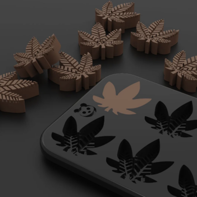 Custom silicone mold for Paradice chocolate tokens by Mold Press Qatar leaf Custom silicone mold for Paradice chocolate tokens by Mold Press Qatar leaf