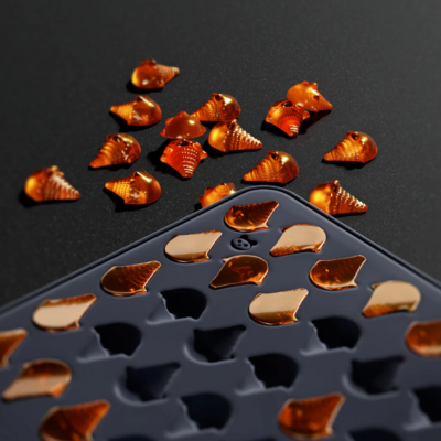 Custom silicone mold for Paradice chocolate tokens by Mold Press Qatar pin choclate token Custom silicone mold for Paradice chocolate tokens by Mold Press Qatar pin choclate token